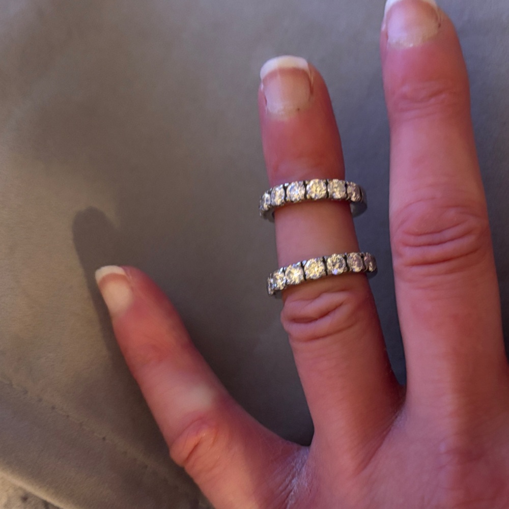 Elegant 10K, solid white gold and lab created diamond band. Size 5.25